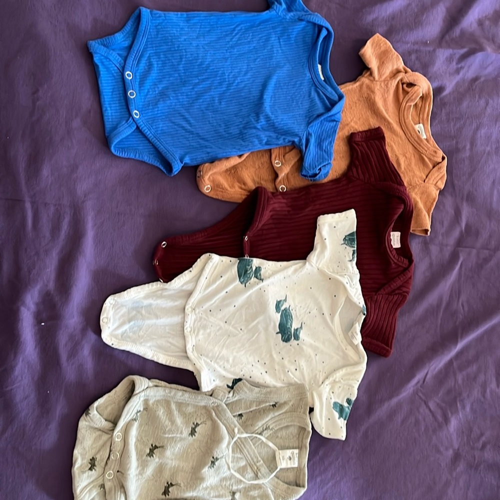 5 Kate Quinn Newborn onesies